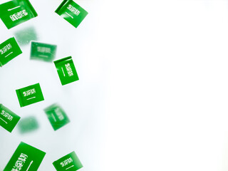 National Day Saudi Arabia. Al-Yaom-ul-Watani. September 23.paper mini flags on a dark background. concept of freedom, patriotism and memory.