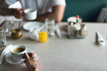 Friends having coffee at a cafe
