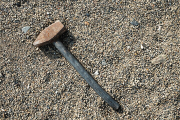 Large sledgehammer for crushing lies on small pebbles