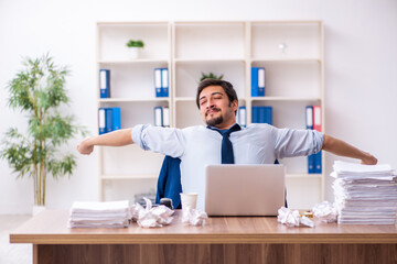 Young male employee rejecting new ideas in the office