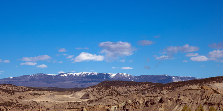 Panoramic view of the Rocky Mountains and a gypsum mine near the town of Gypsum, Colorado