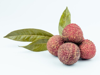Fresh lychee with leaves isolated on white background