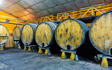 Inside view of Asturian Sidreria with wooden cider barrels