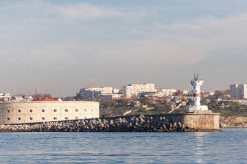 Fort at the entrance to Sevastopol Bay. Lighthouse at the entrance to the bay in Sevastopol.