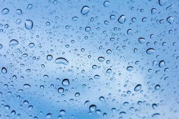 Drops falling on the car glass