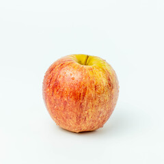 Fresh red apple fruit and water droplets isolated on white background