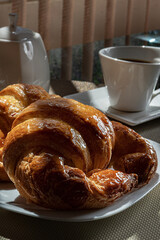 cup of coffee and croissant