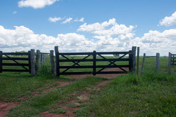 gatekeeper at cattle farm entrance