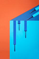 Geometric still life with five blue razors