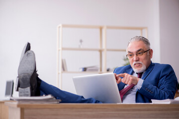 Old male employee and too much work in the office