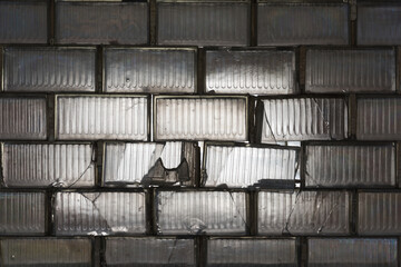 Old glass blocks with white light in the background 