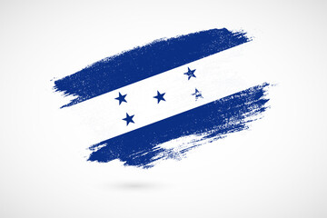 Happy independence day of Honduras with vintage style brush flag background