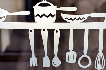 Sticker to decorate your shop window with white silhouettes of kitchen utensils.