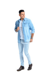 Fototapeta premium Fashionable young man on white background