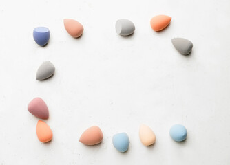 Makeup sponges on white background