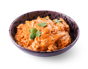 Bowl of tasty chicken tikka masala on white background