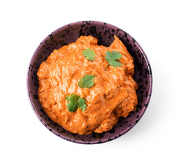 Bowl of tasty chicken tikka masala on white background