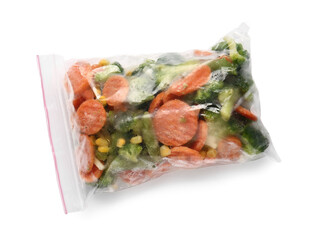 Plastic bag with frozen vegetables on white background