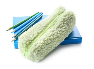Pencil case and stationery on white background