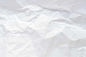 Fototapeta premium White crumpled paper texture background.