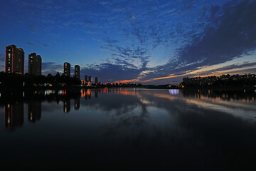 Naklejka premium Evening scenery of waterfront city, North China