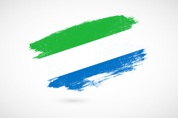 Happy independence day of Sierra Leone with vintage style brush flag background