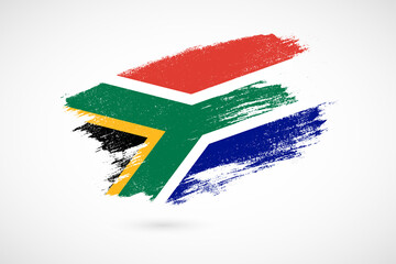 Happy independence day of South Africa with vintage style brush flag background