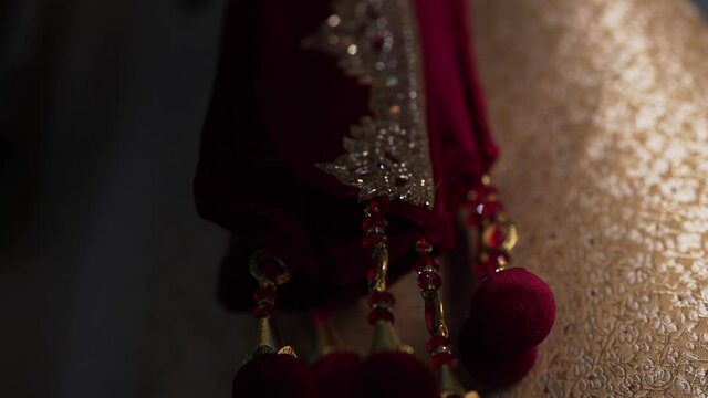 Close up static shot of Sherwani shawl of groom at Indian Wedding. Groom&rsquo;s fashion at Indian marriage ceremony. 