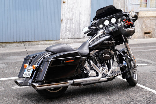 harley davidson electra road glide motorbike black american Motorcycle bagger cruiser parked in street
