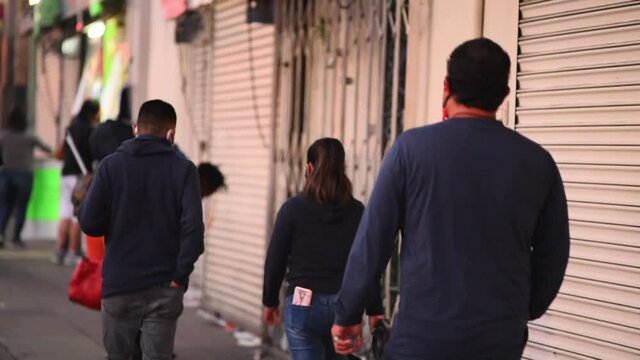 Young mexicans walking on street in Mexico