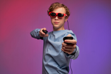 teenage boy trying augmented reality glasses, feeling excited about VR headset simulation and controllers, exploring virtual life by gesturing hands to touch 3d world, having fun with goggles