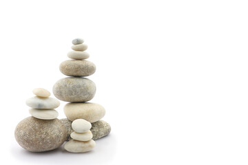 Fototapeta na wymiar Spa concept on stone background. Balance of stones. isolate on white background. Font view and copy space