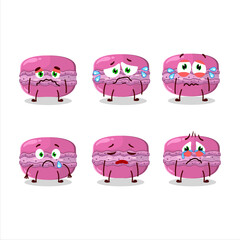 Strawberry macaron cartoon character with sad expression