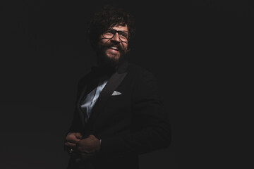 businessman closing his tuxedo and having a good time