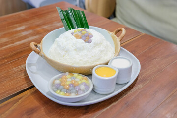 Thai style bingsu with pastel sticy rice pearls and salted egg yolk.