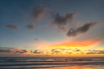 Majestic sunset or sunrise landscape Amazing light of nature cloudscape sky and Clouds moving away rolling .Beautiful Phuket beach is a famous tourist destination in Andaman sea summer. 