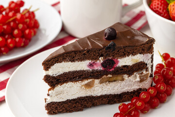 Piece of chocolate cake on table close up
