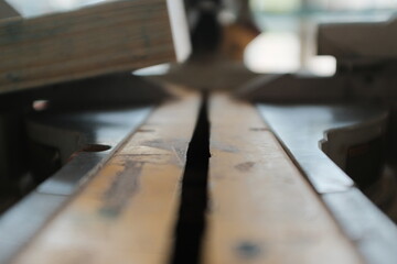close up of a saw cutting wood