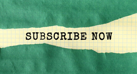 SUBSCRIBE NOW message written under green torn paper