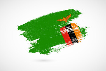 Happy independence day of Zambia with vintage style brush flag background - obrazy, fototapety, plakaty