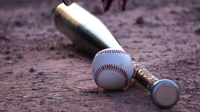 Baseball ball with the practice of a male baseball player