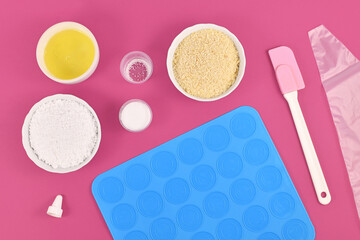 Flat lay with ingredients and tools for baking homemade French Macaron sweets
