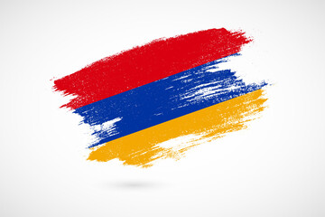 Happy independence day of Armenia with vintage style brush flag background