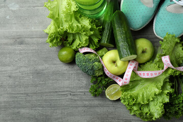 Healthy lifestyle accessories on gray textured background