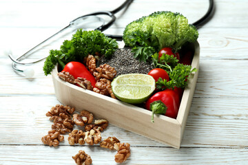 Healthy lifestyle accessories on white wooden table