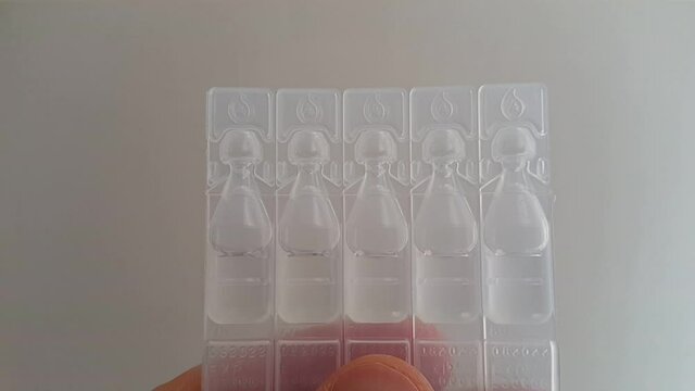 artificial tear drop in plastic container