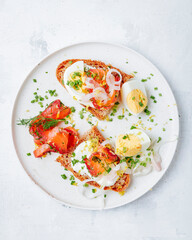 Gravlax, eggs and pickled onion sandwich