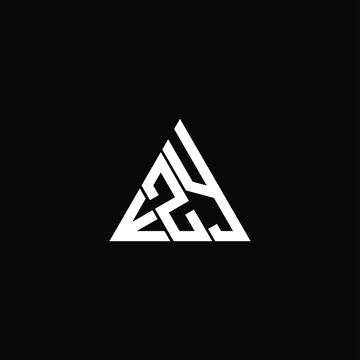 E Z Y letter logo abstract creative design. E Z Y unique design