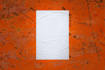 Blank white wheatpaste glued paper poster mockup on old metal wall background