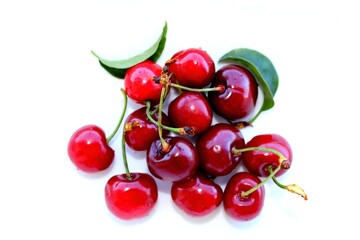  Fresh cherries on a white background, summer fruits, top view
